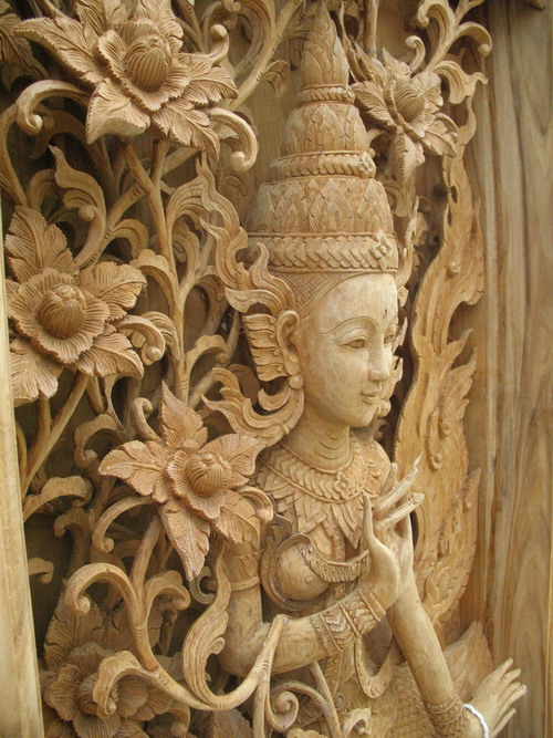 skillful woodcarving of a traditional thai angle